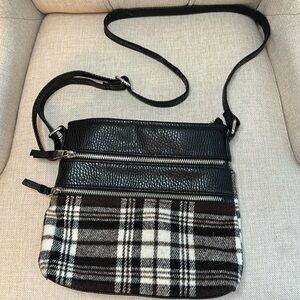 Black, brown and cream colored purse